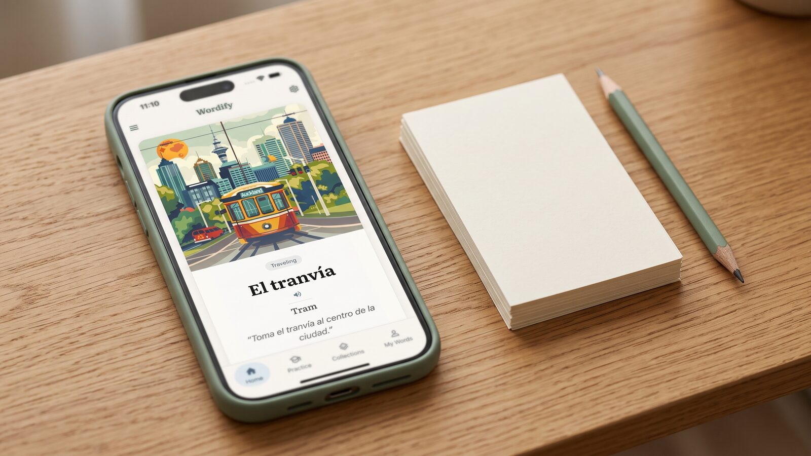 A stack of flashcards next to a phone showing a vocabulary review session, illustrating active recall versus passive re-reading